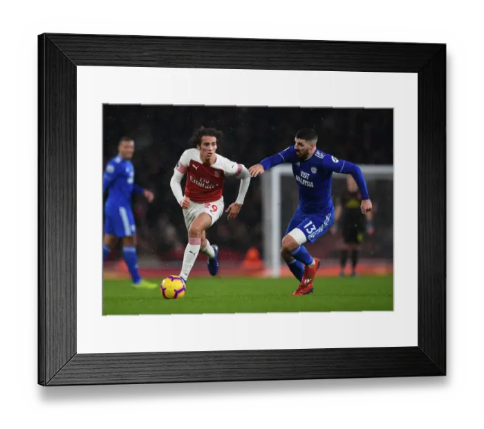 Framed Print : Arsenal vs. Cardiff: Guendouzi Clashes with Paterson in Premier League Showdown
