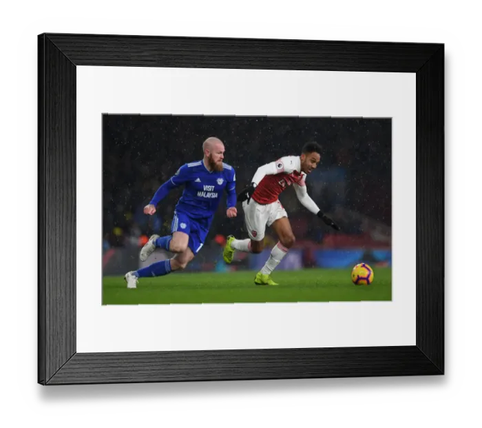 Framed Print : Arsenal's Aubameyang Clashes with Cardiff's Gunnarsson in Premier League Showdown Framed Print : Arsenal's Aubameyang Clashes with Cardiff's Gunnarsson in Premier League Showdown
