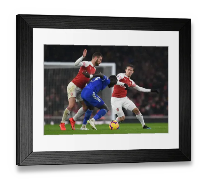 Framed Print : Arsenal vs. Cardiff: Mustafi and Monreal Clash in Premier League Showdown Framed Print : Arsenal vs. Cardiff: Mustafi and Monreal Clash in Premier League Showdown