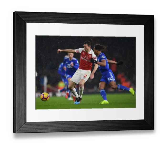 Framed Print : Arsenal vs. Cardiff: Stephan Lichtsteiner Faces Off Against Bobby Reid in Premier League Clash Framed Print : Arsenal vs. Cardiff: Stephan Lichtsteiner Faces Off Against Bobby Reid in Premier League Clash
