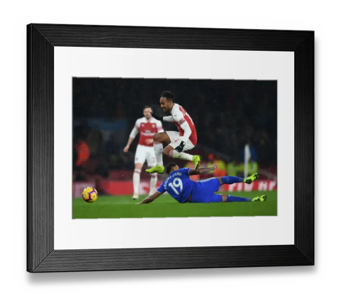 Framed Print : Arsenal's Aubameyang Scores Past Cardiff's Mendez-Laing in Premier League Clash Framed Print : Arsenal's Aubameyang Scores Past Cardiff's Mendez-Laing in Premier League Clash