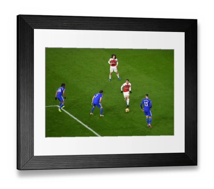 Framed Print : Arsenal's Mesut Ozil Slices Through Cardiff Defense in Premier League Clash (Arsenal v Cardiff City, 2018-19)