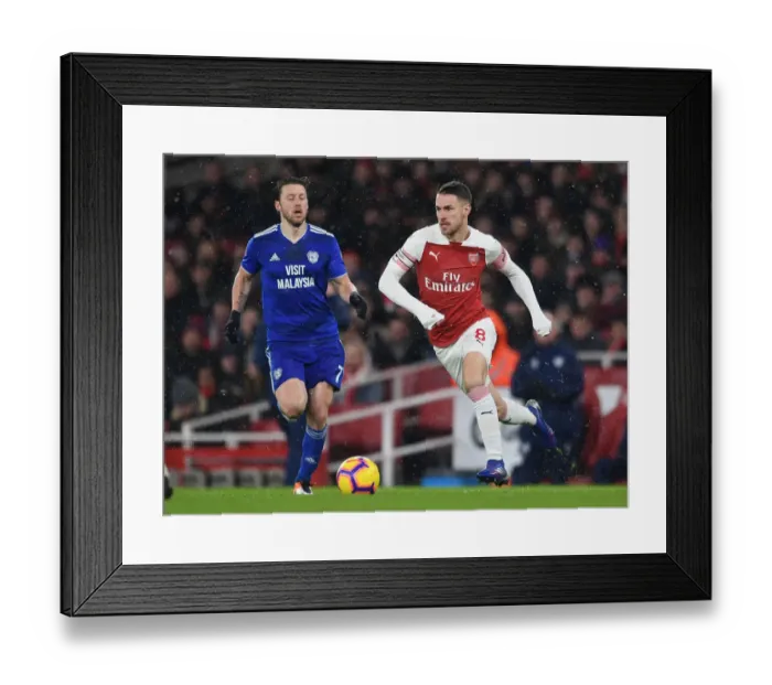 Framed Print : Arsenal's Ramsey Battles Arter in Premier League Clash vs. Cardiff City Framed Print : Arsenal's Ramsey Battles Arter in Premier League Clash vs. Cardiff City