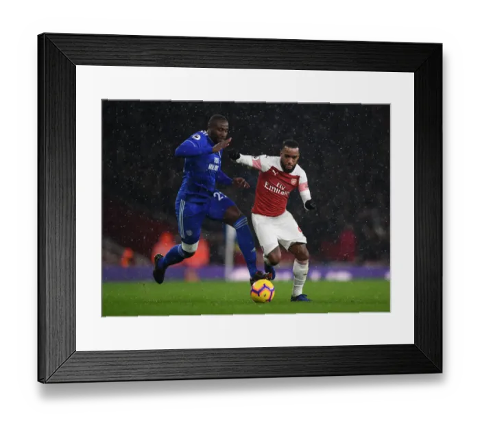 Framed Print : Intense Battle: Lacazette vs. Bamba - Arsenal vs. Cardiff Premier League Clash Framed Print : Intense Battle: Lacazette vs. Bamba - Arsenal vs. Cardiff Premier League Clash
