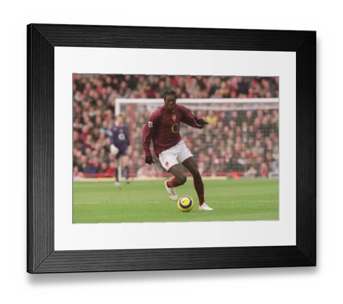Framed Print : Emmanuel Adebayor in Action for Arsenal Against Bolton Wanderers, FA Premiership, Highbury, London, 2006 Framed Print : Emmanuel Adebayor in Action for Arsenal Against Bolton Wanderers, FA Premiership, Highbury, London, 2006
