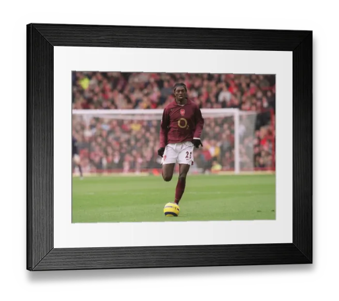 Framed Print : Arsenal's Adebayor Scores Dramatic Goal vs. Bolton Wanderers at Highbury, 2006 Framed Print : Arsenal's Adebayor Scores Dramatic Goal vs. Bolton Wanderers at Highbury, 2006