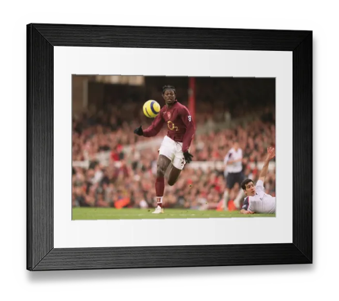 Framed Print : Adebayor's Dramatic Goal: Arsenal's Highbury Victory over Bolton Wanderers, FA Premiership 2006 Framed Print : Adebayor's Dramatic Goal: Arsenal's Highbury Victory over Bolton Wanderers, FA Premiership 2006
