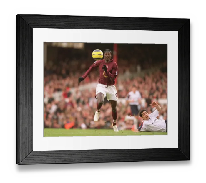 Framed Print : Emmanuel Adebayor (Arsenal) Tal Ben Haim (Bolton). Arsenal 1: 1 Bolton Wanderers Framed Print : Emmanuel Adebayor (Arsenal) Tal Ben Haim (Bolton). Arsenal 1: 1 Bolton Wanderers