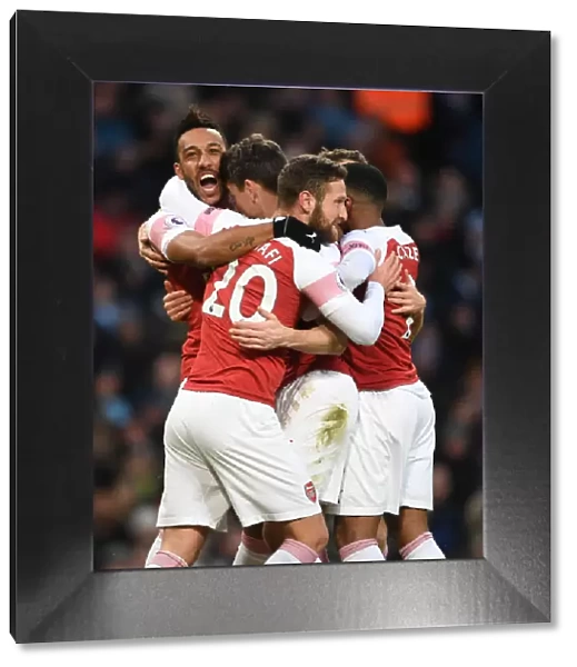 Arsenal's Laurent Koscielny, Pierre-Emerick Aubameyang, and Shkodran Mustafi Celebrate Goal Against Manchester City (2018-19)