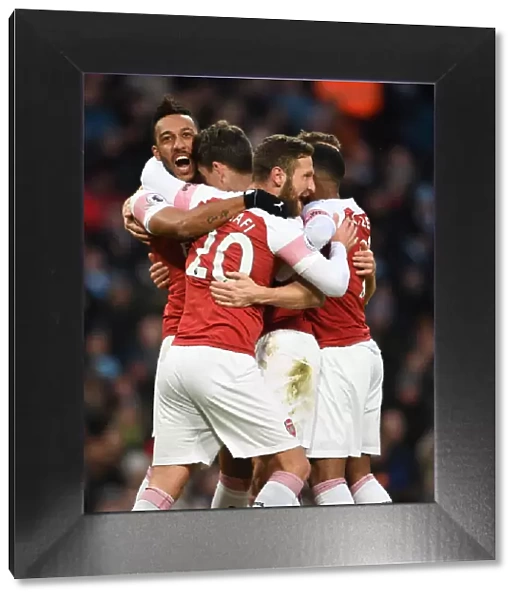 Arsenal's Koscielny, Aubameyang, and Mustafi Celebrate Goal Against Manchester City (2018-19)