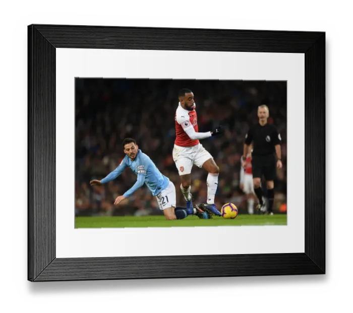 Framed Print : Manchester Derby: Lacazette vs. Silva - A Premier League Battle Framed Print : Manchester Derby: Lacazette vs. Silva - A Premier League Battle