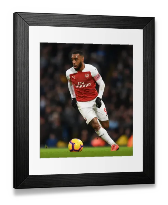 Framed Print : Alexandre Lacazette Faces Manchester City: Premier League Clash 2018-19 Framed Print : Alexandre Lacazette Faces Manchester City: Premier League Clash 2018-19
