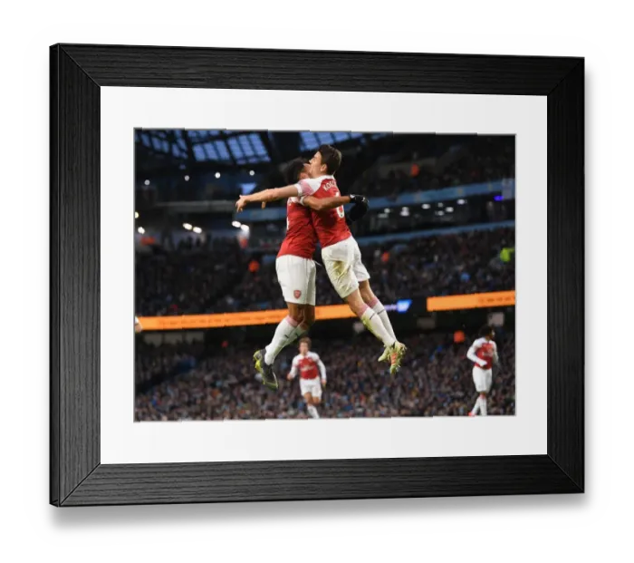 Framed Print : Koscielny and Aubameyang Celebrate Arsenal's Goal Against Manchester City (2018-19)