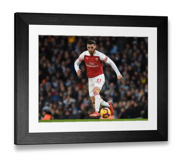 Framed Print : Sead Kolasinac of Arsenal Faces Off Against Manchester City in Premier League Clash