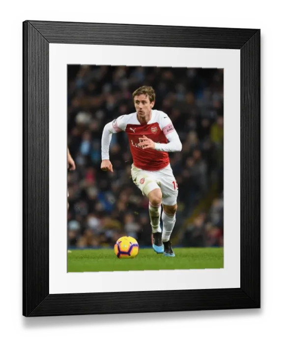 Framed Print : Nacho Monreal Focuses in Manchester City vs Arsenal Premier League Clash (2018-19) Framed Print : Nacho Monreal Focuses in Manchester City vs Arsenal Premier League Clash (2018-19)