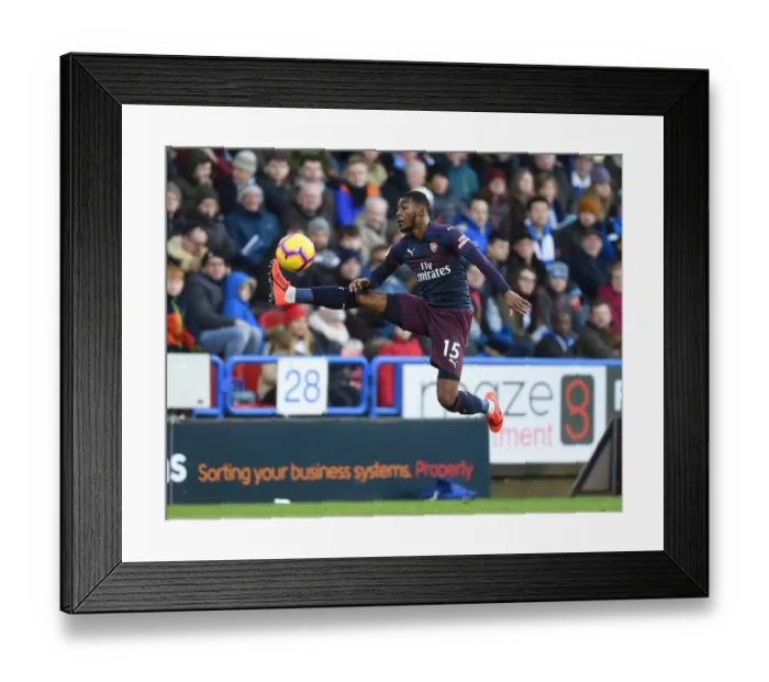 Framed Print : Arsenal's Ainsley Maitland-Niles in Action against Huddersfield Town in Premier League