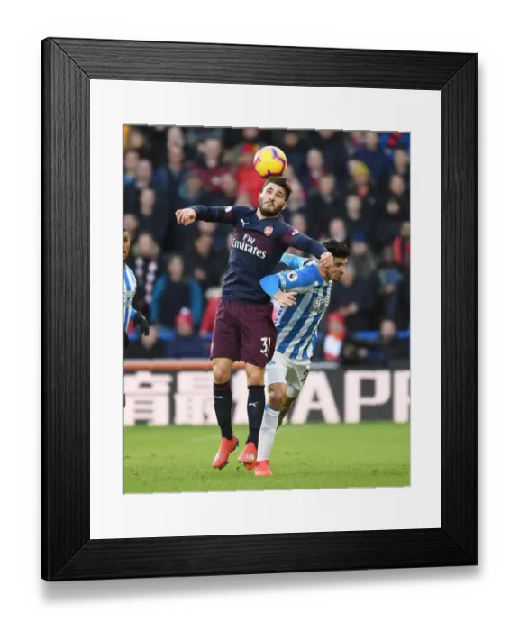 Framed Print : Intense Face-Off: Sead Kolasinac vs. Christopher Schindler - Huddersfield Town vs. Arsenal FC Premier League Clash Framed Print : Intense Face-Off: Sead Kolasinac vs. Christopher Schindler - Huddersfield Town vs. Arsenal FC Premier League Clash