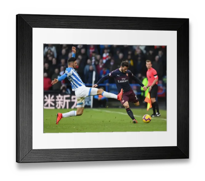 Framed Print : Sead Kolasinac vs. Christopher Schindler: Intense Clash in Huddersfield Town vs. Arsenal FC Premier League Match Framed Print : Sead Kolasinac vs. Christopher Schindler: Intense Clash in Huddersfield Town vs. Arsenal FC Premier League Match
