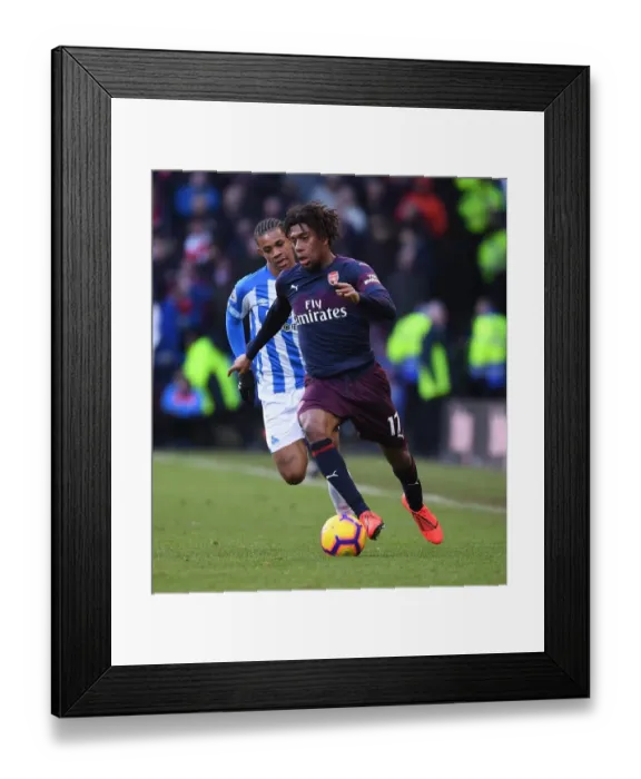 Framed Print : Alex Iwobi in Action: Huddersfield Town vs Arsenal FC, Premier League Framed Print : Alex Iwobi in Action: Huddersfield Town vs Arsenal FC, Premier League