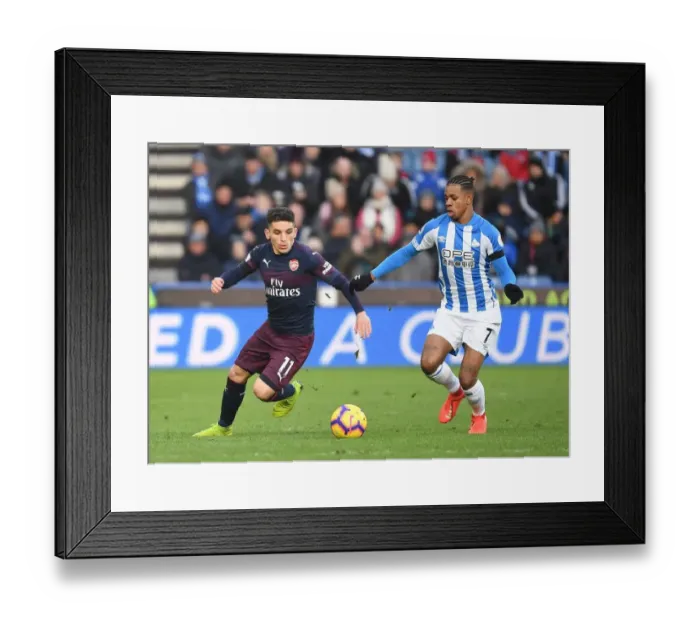 Framed Print : Torreira Tears Through Huddersfield: Arsenal's Lucas Torreira Outmaneuvers Opponent During Premier League Clash