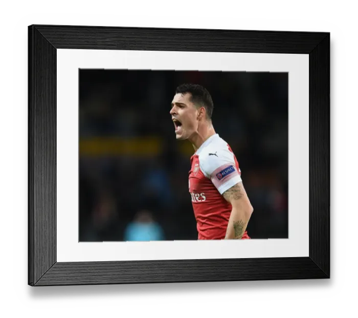 Framed Print : Arsenal's Granit Xhaka in Action against BATE Borisov in UEFA Europa League Round of 32 First Leg