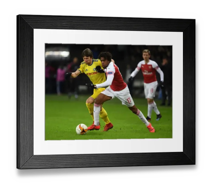 Framed Print : Arsenal's Alex Iwobi vs. Dmitri Baga: A Europa League Showdown at BATE Borisov Framed Print : Arsenal's Alex Iwobi vs. Dmitri Baga: A Europa League Showdown at BATE Borisov