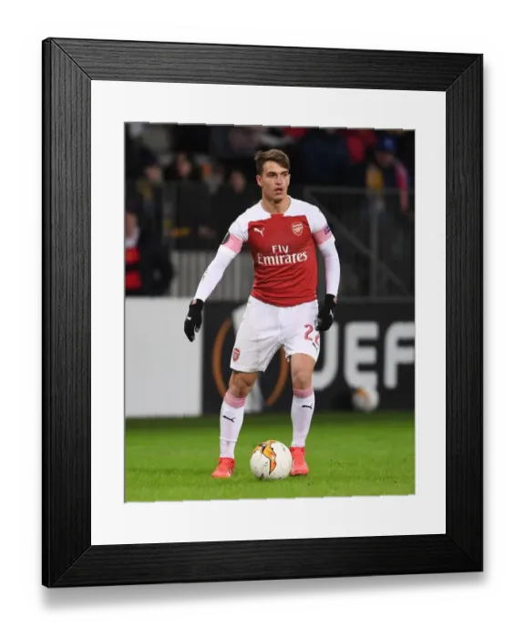 Framed Print : Arsenal's Denis Suarez in Action against BATE Borisov in UEFA Europa League Round of 32 First Leg