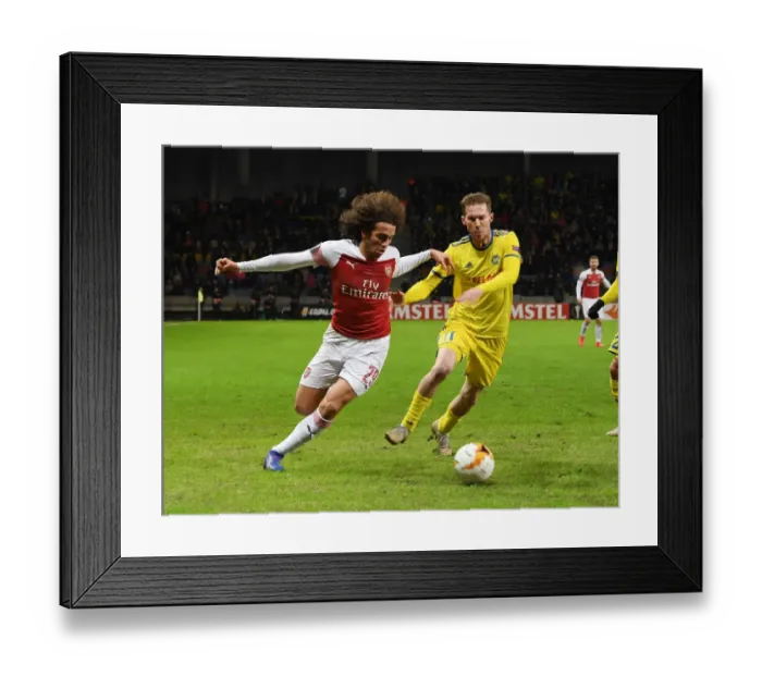 Framed Print : Arsenal's Guendouzi Overpowers Hleb: Matteo Guendouzi's Dominant Performance Against BATE's Aleksandr Hleb in Europa League Clash Framed Print : Arsenal's Guendouzi Overpowers Hleb: Matteo Guendouzi's Dominant Performance Against BATE's Aleksandr Hleb in Europa League Clash