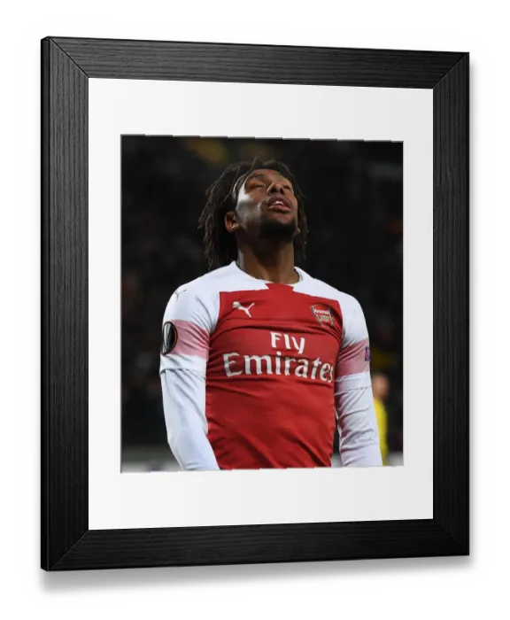 Framed Print : Dejected Alex Iwobi: Arsenal's Europa League Struggles Against BATE Borisov Framed Print : Dejected Alex Iwobi: Arsenal's Europa League Struggles Against BATE Borisov