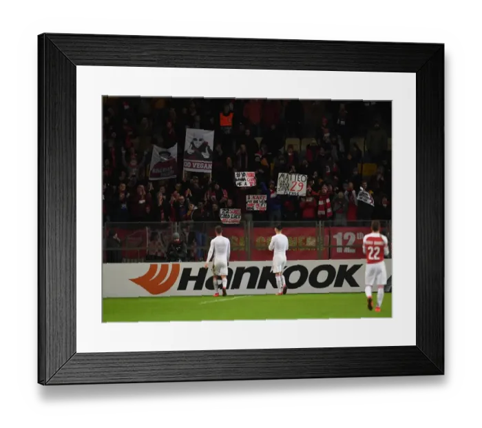 Framed Print : Arsenal Players Celebrate Europa League Victory with Ecstatic Fans