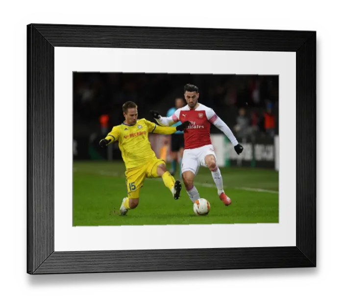 Framed Print : BATE Borisov vs. Arsenal: Sead Kolasinac Faces Off Against Maksim Skavysh in Europa League Clash