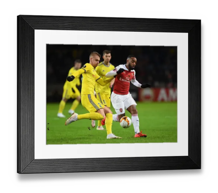 Framed Print : Alexandre Lacazette vs Zakhar Volkov: Clash in the Europa League as Arsenal Face BATE Borisov