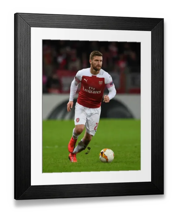 Framed Print : Arsenal's Mustafi in Action: Europa League Clash against BATE Borisov (2019)