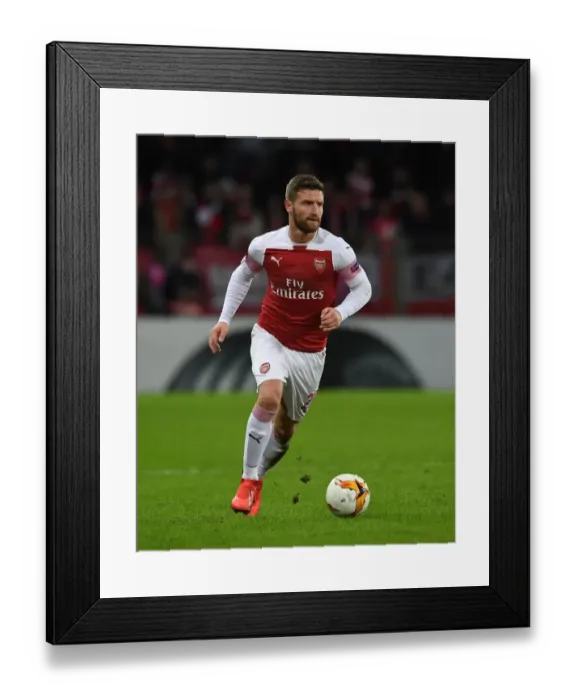 Framed Print : Shkodran Mustafi in Action: Arsenal vs BATE Borisov, UEFA Europa League Round of 32 (First Leg)