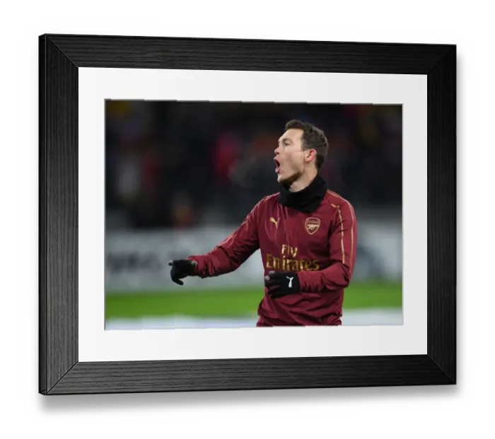 Framed Print : Stephan Lichtsteiner Gears Up: Arsenal vs BATE Borisov, UEFA Europa League Round of 32 (First Leg)