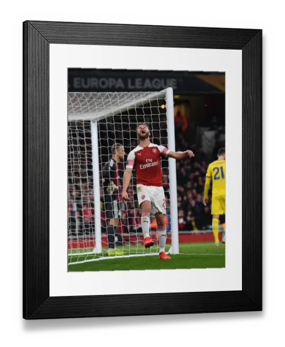 Framed Print : Mustafi Scores the Winning Goal: Arsenal Secures Europa League Victory over BATE Borisov Framed Print : Mustafi Scores the Winning Goal: Arsenal Secures Europa League Victory over BATE Borisov