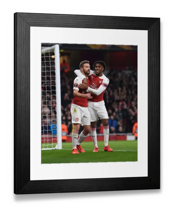 Framed Print : Arsenal's Mustafi and Iwobi Celebrate Goals Against BATE Borisov in Europa League