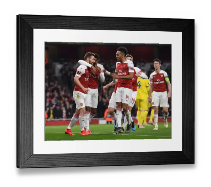 Framed Print : Arsenal's Mustafi and Aubameyang: United in Victory - Europa League Goal Celebration