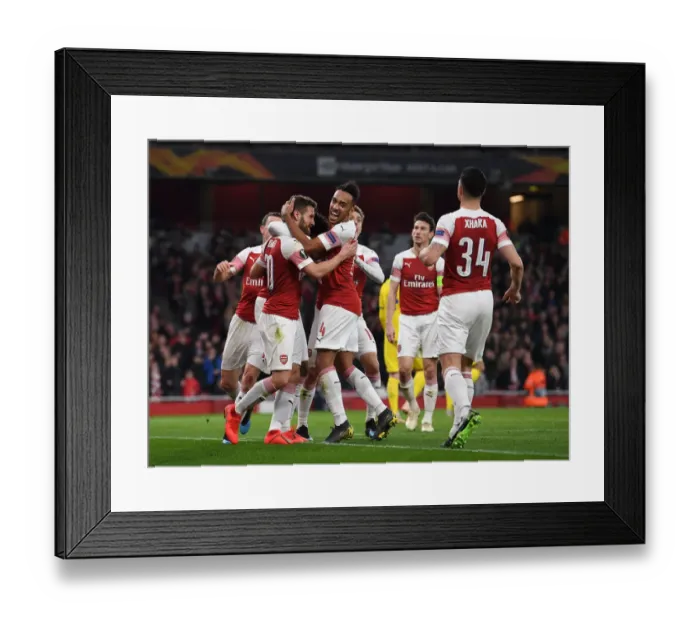 Framed Print : Arsenal's Mustafi and Aubameyang Celebrate Goals in Europa League Victory over BATE Borisov