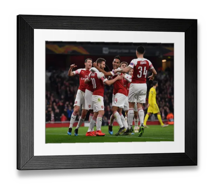 Framed Print : United in Victory: Mustafi and Aubameyang's Europa League Goal Celebration (Arsenal FC) Framed Print : United in Victory: Mustafi and Aubameyang's Europa League Goal Celebration (Arsenal FC)