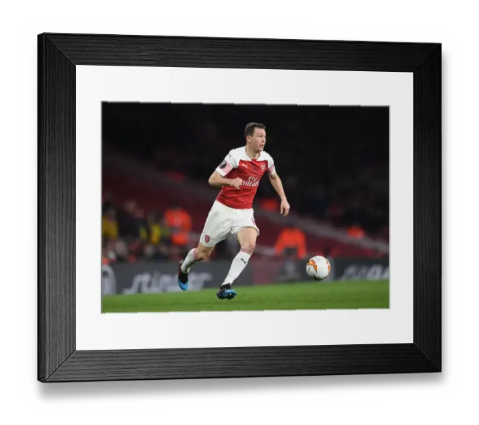 Framed Print : Arsenal's Stephan Lichtsteiner in Europa League Action: Arsenal vs BATE Borisov at Emirates Stadium