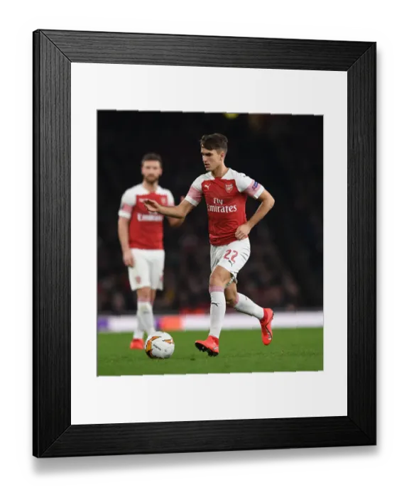 Framed Print : Arsenal's Denis Suarez in Action against BATE Borisov in UEFA Europa League Round of 32