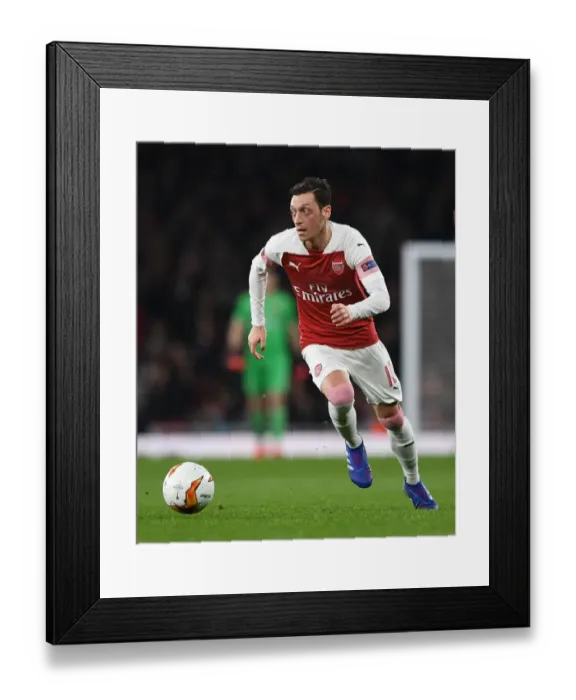 Framed Print : Arsenal's Mesut Ozil in Action against BATE Borisov in the Europa League Round of 32 (2018-19)
