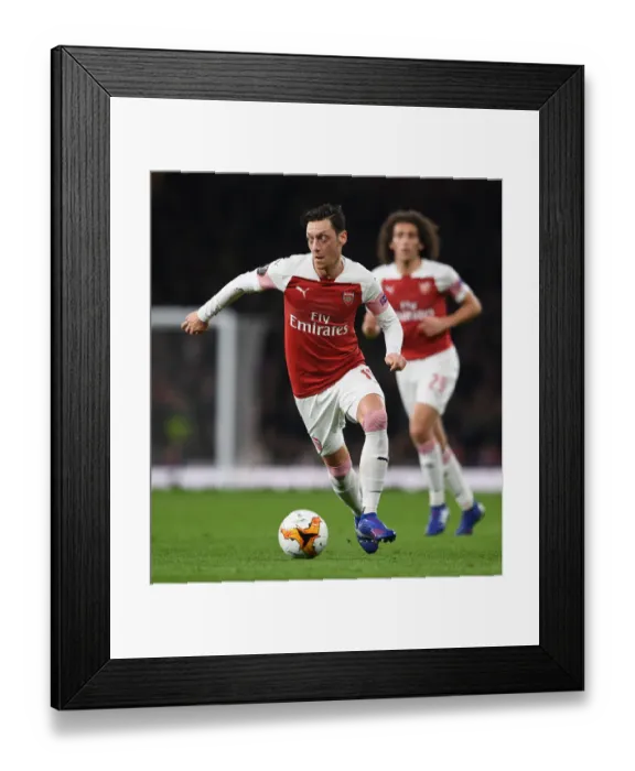 Framed Print : Mesut Ozil in Action: Arsenal vs. BATE Borisov, UEFA Europa League 2018-19