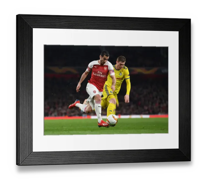 Framed Print : Arsenal's Mkhitaryan Clashes with BATE's Filipovic in Europa League Showdown