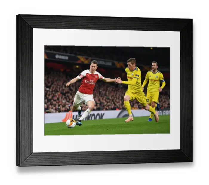 Framed Print : Arsenal vs BATE Borisov: A Battle of Lichtsteiner and Filipovic in the Europa League