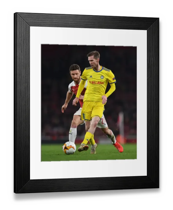 Framed Print : Arsenal's Europa League Triumph: Mustafi Shuts Down Hleb's Threat Framed Print : Arsenal's Europa League Triumph: Mustafi Shuts Down Hleb's Threat