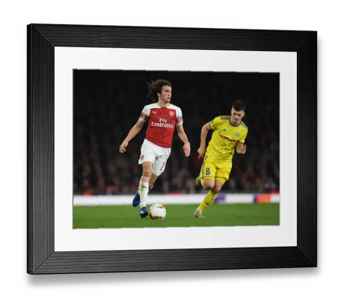 Framed Print : Guendouzi vs Dragun: A Europa League Showdown at the Emirates Framed Print : Guendouzi vs Dragun: A Europa League Showdown at the Emirates