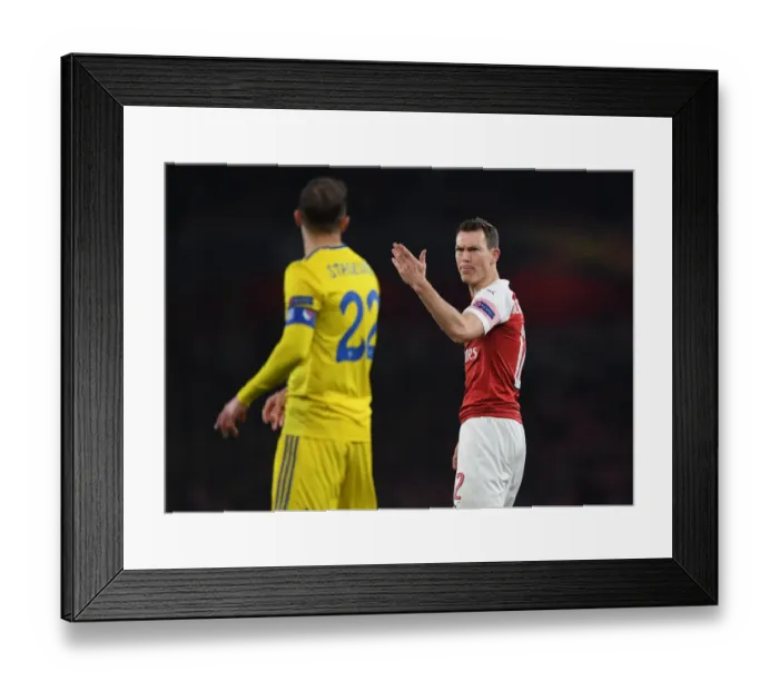 Framed Print : Arsenal's Stephan Lichtsteiner in Europa League Action vs BATE Borisov at Emirates Stadium Framed Print : Arsenal's Stephan Lichtsteiner in Europa League Action vs BATE Borisov at Emirates Stadium
