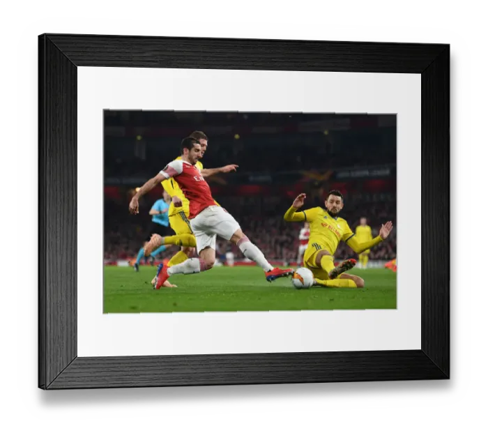 Framed Print : Arsenal's Mkhitaryan Faces Off Against BATE's Filipenko in Europa League Showdown